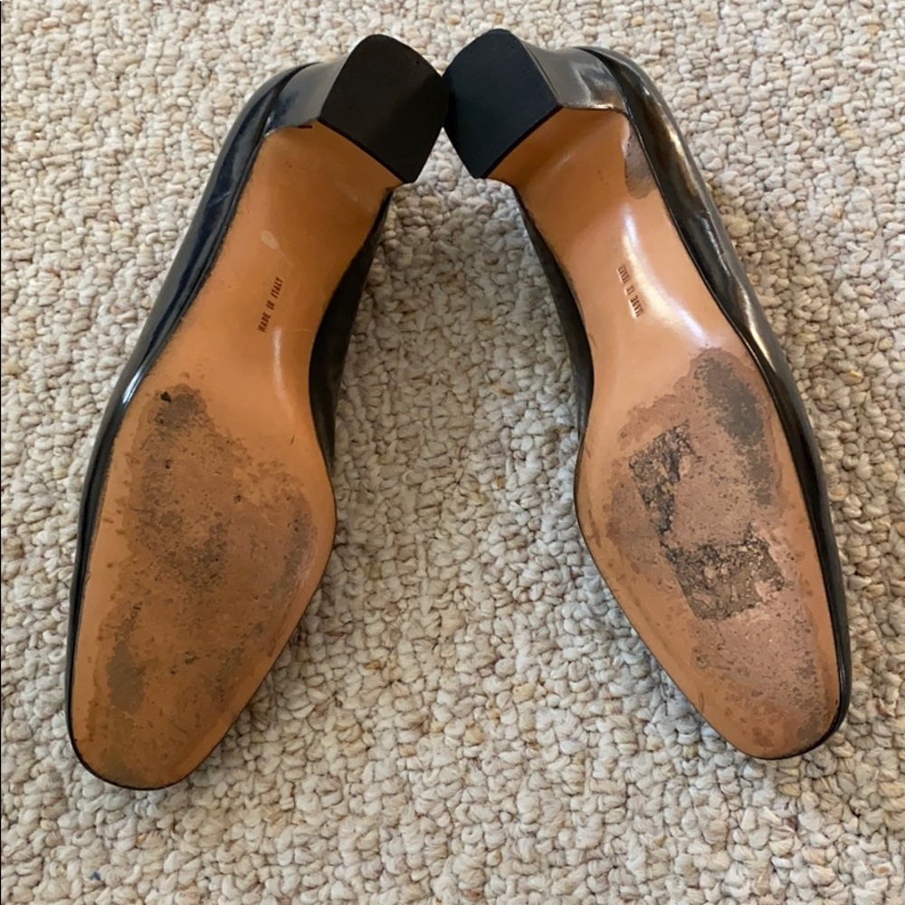 Designer black pumps